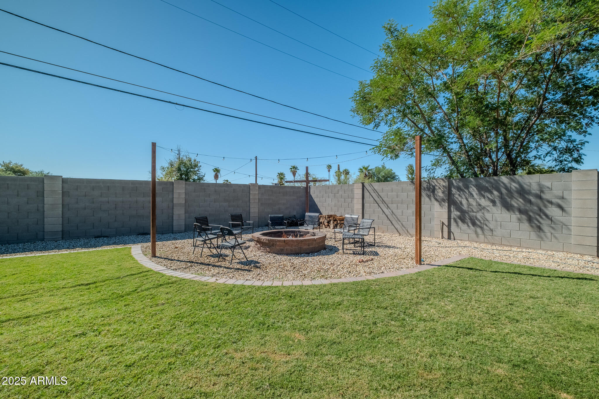 841 East Granada Avenue Apache Junction, AZ 85119 - Photo 9 of 33 a view of a backyard with plants and patio