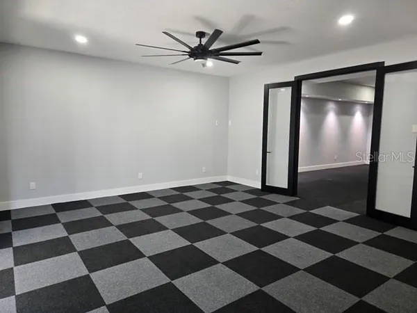 a black and white checkered floor with a black white checkered floor