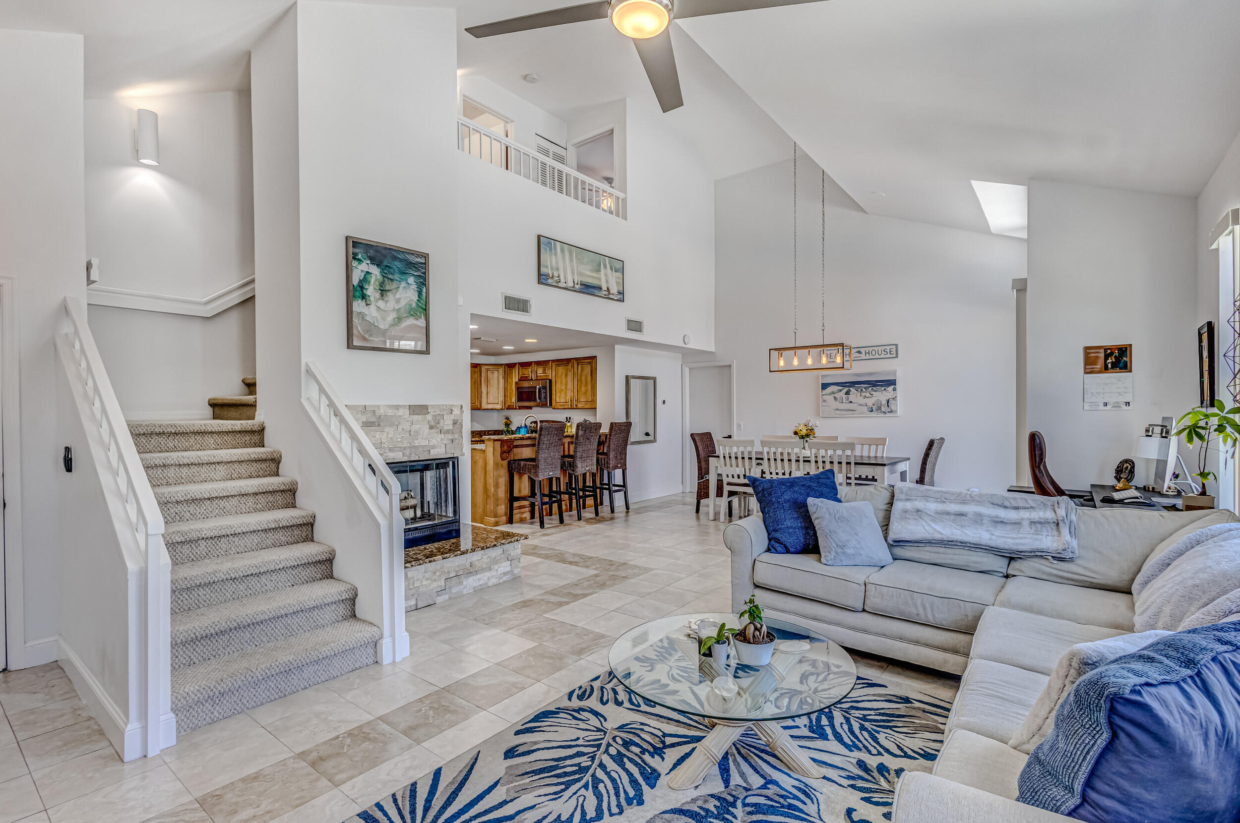 1701 Mizzenmast Way Jupiter, FL 33477 - Photo 14 of 64 a living room with furniture and wooden floor