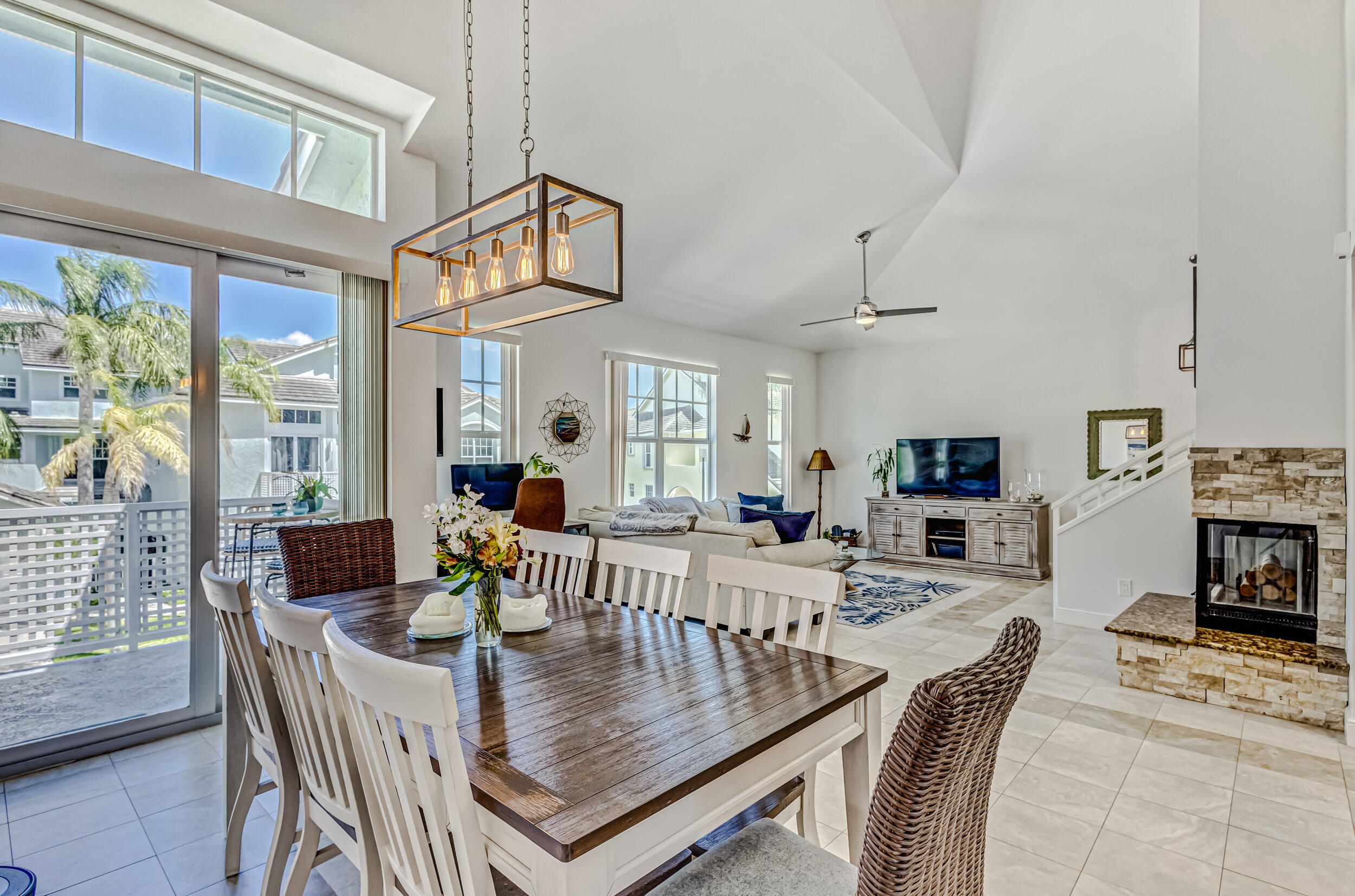 1701 Mizzenmast Way Jupiter, FL 33477 - Photo 24 of 64 a view of a dining room with furniture window and outside view