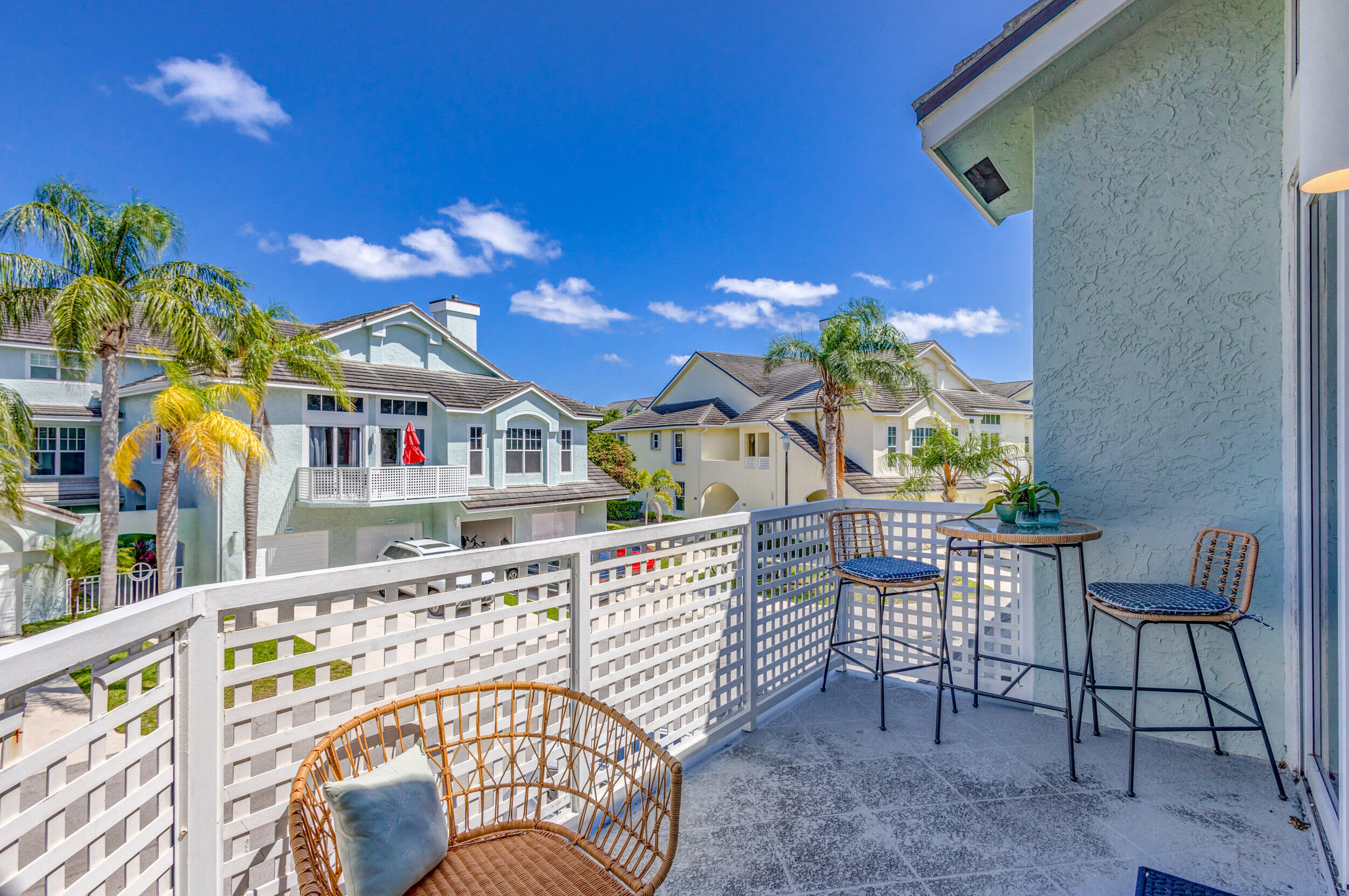 1701 Mizzenmast Way Jupiter, FL 33477 - Photo 35 of 64 a view of an chairs and tables in the balcony