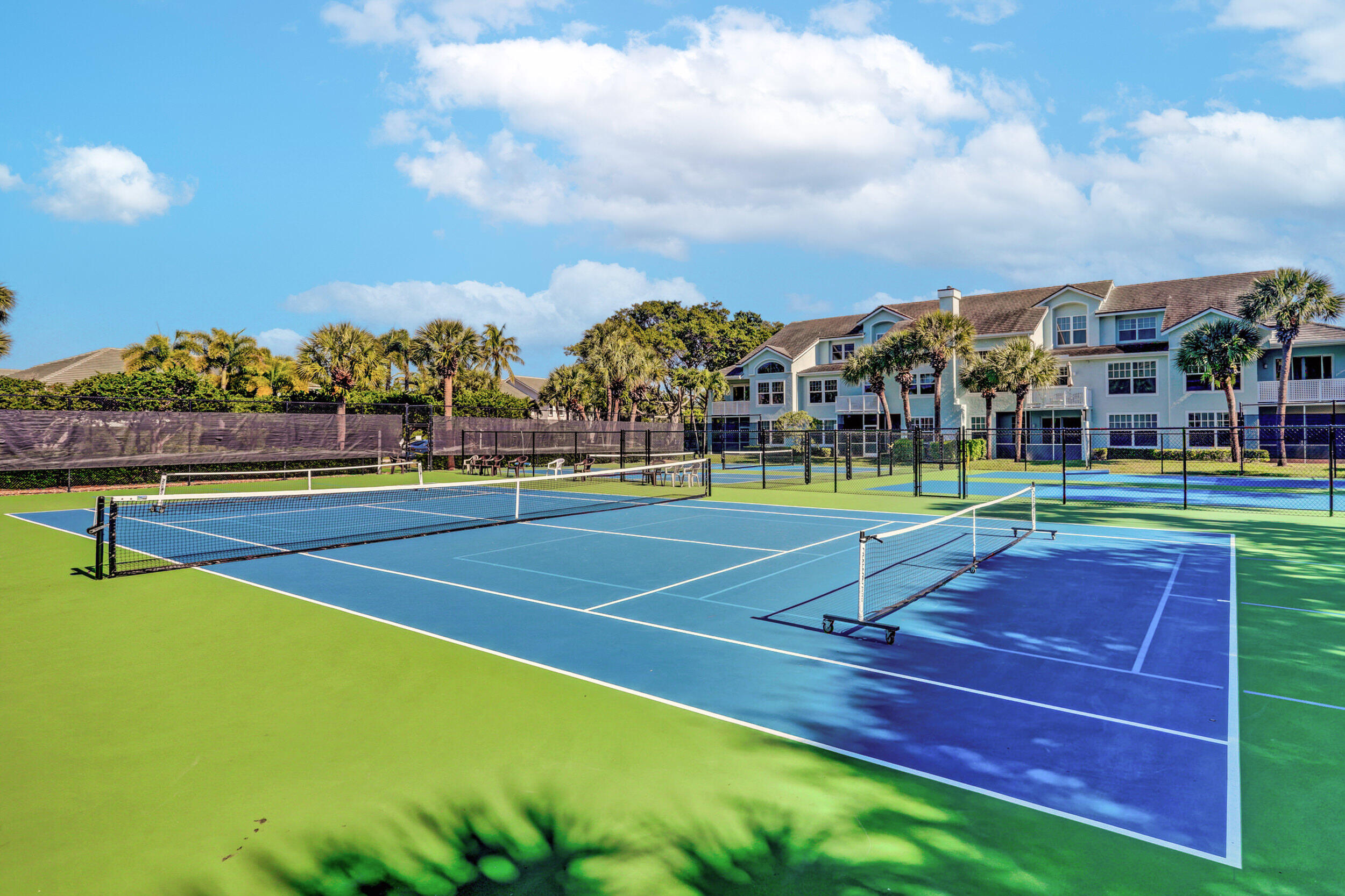 1701 Mizzenmast Way Jupiter, FL 33477 - Photo 52 of 64 a view of a tennis court