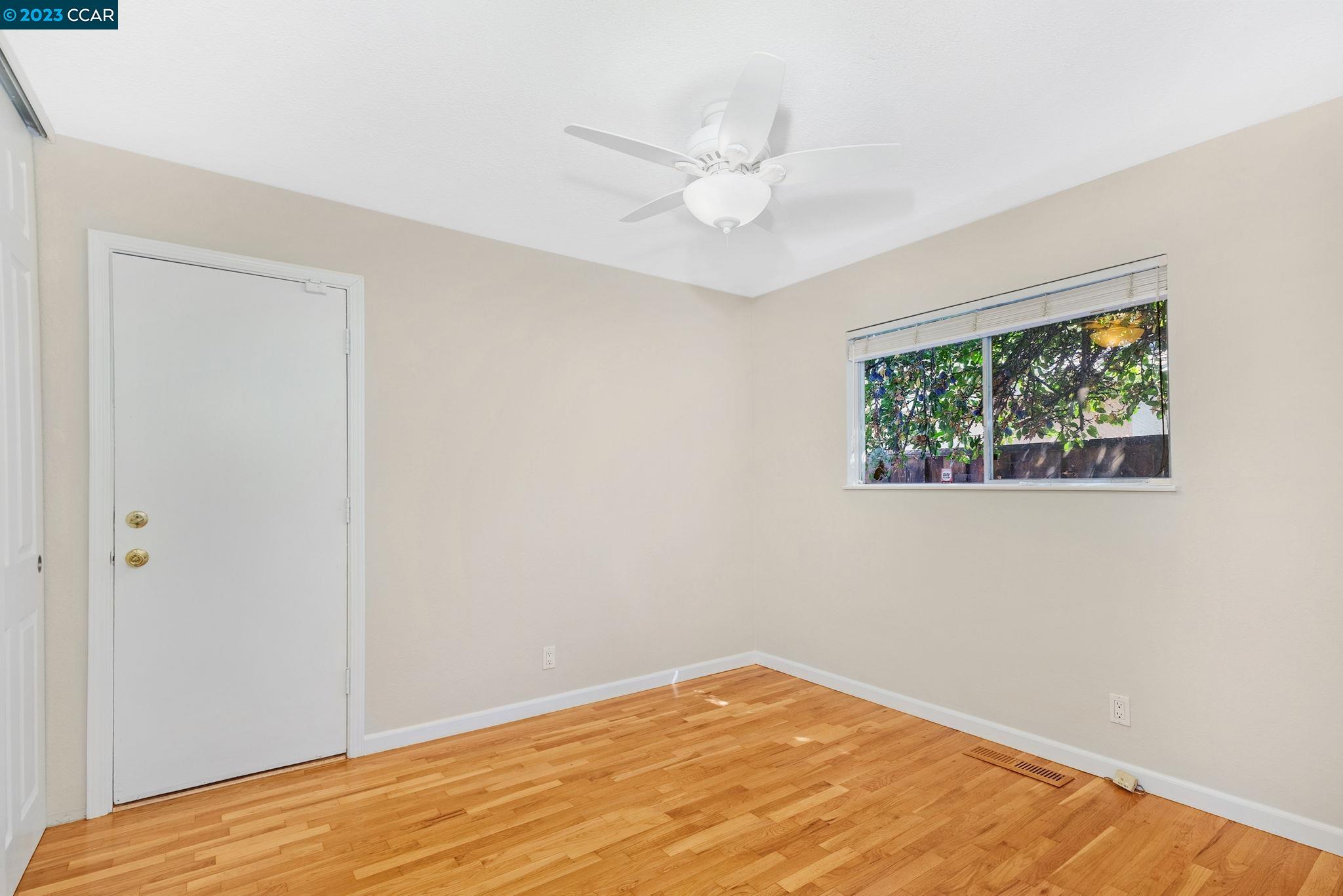4266 Carter Court Concord, CA 94521 - Photo 18 of 26 a view of empty room with wooden floor