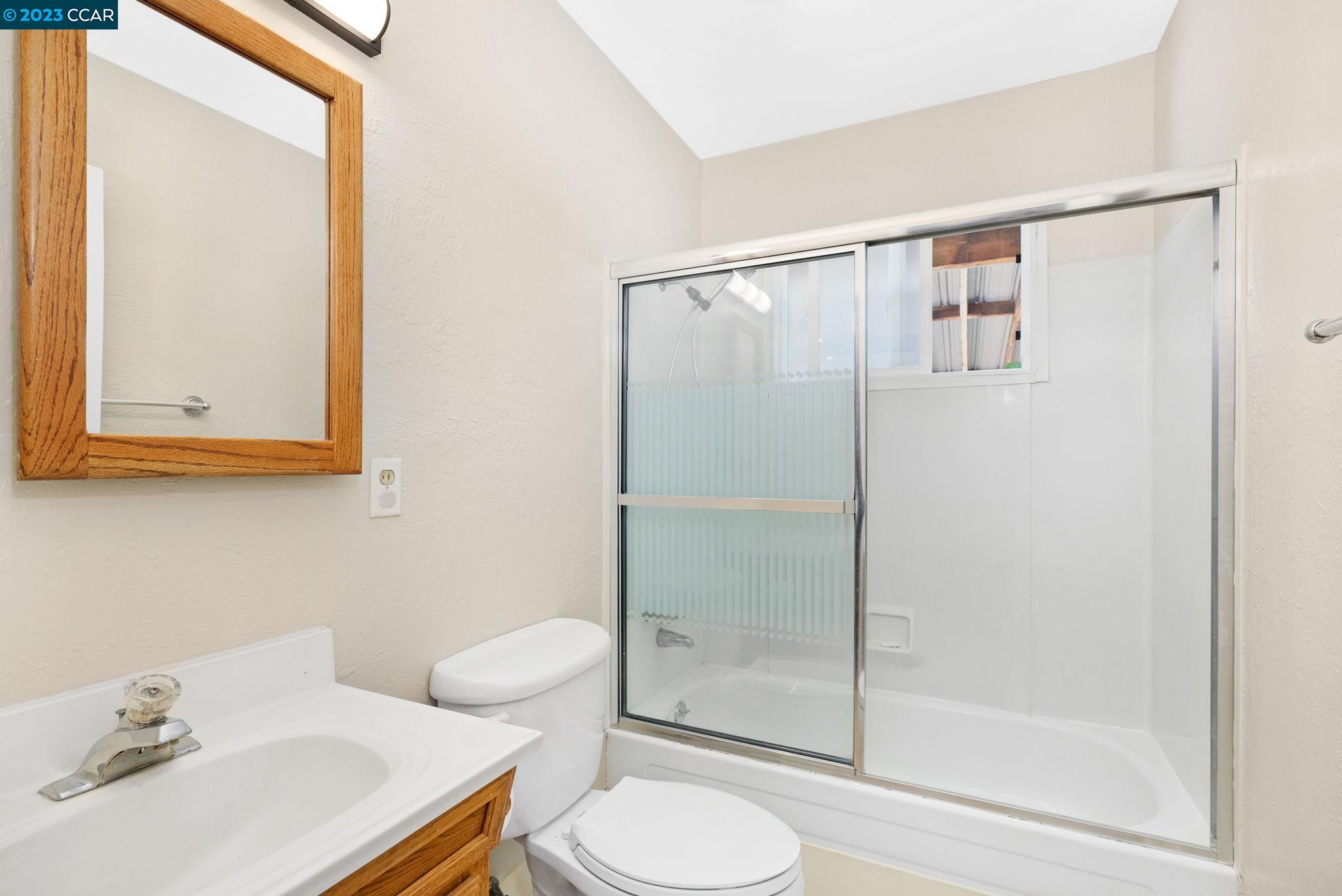 4266 Carter Court Concord, CA 94521 - Photo 20 of 26 a bathroom with a sink toilet and shower