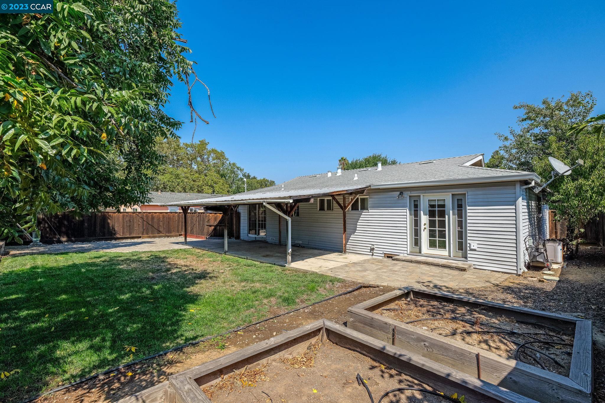 4266 Carter Court Concord, CA 94521 - Photo 23 of 26 front view of a house with yard