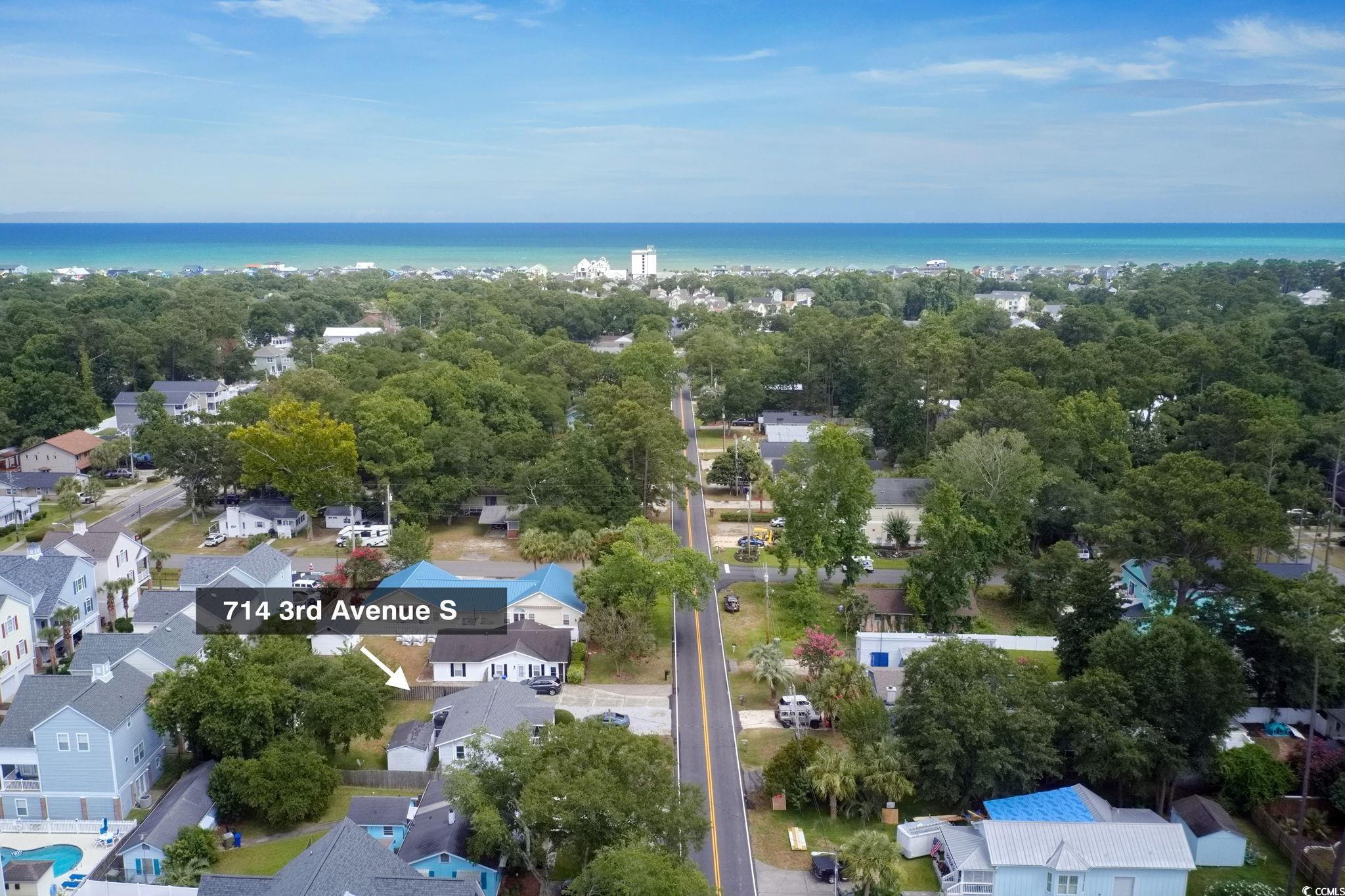 714 3rd Avenue South Surfside Beach, SC 29575 - Photo 27 of 30 Aerial perspective of suburban area featuring a large body of water