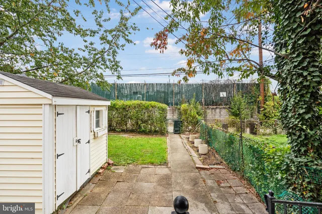 a view of a back yard of the house