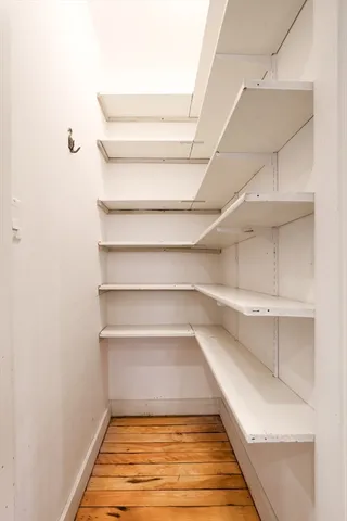 a bedroom with a bed and a view of bathroom