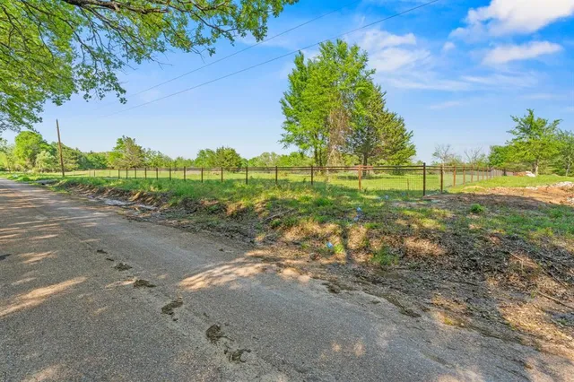 a view of outdoor space with deck and yard