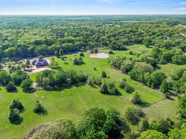 a view of a garden with an outdoor space