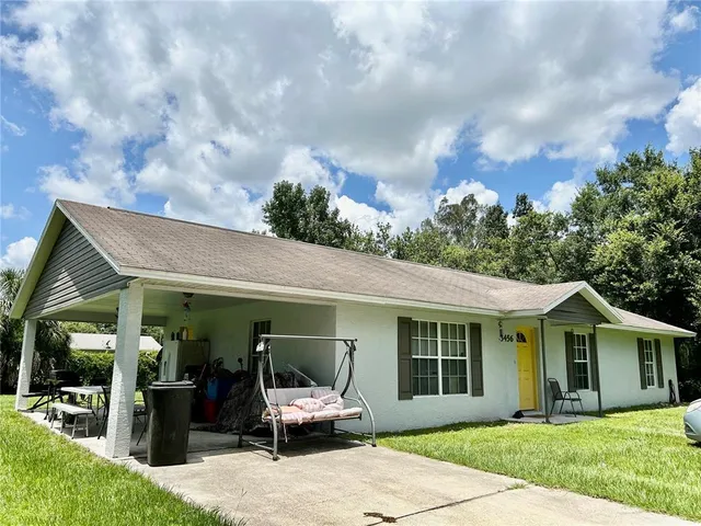 a front view of a house with a porch