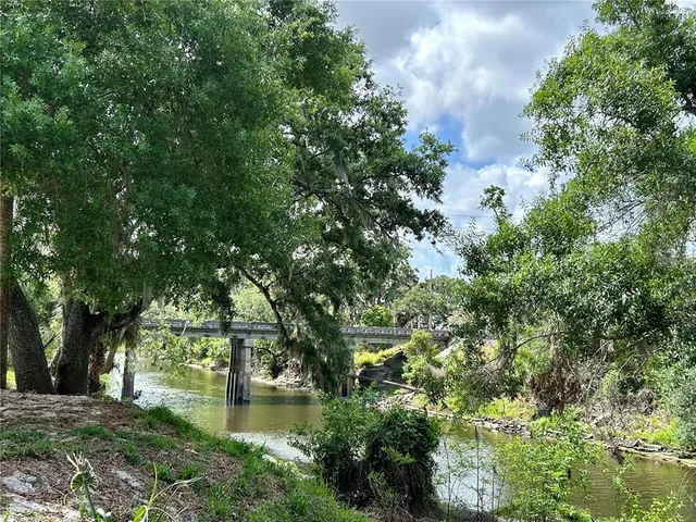 a view of house with yard
