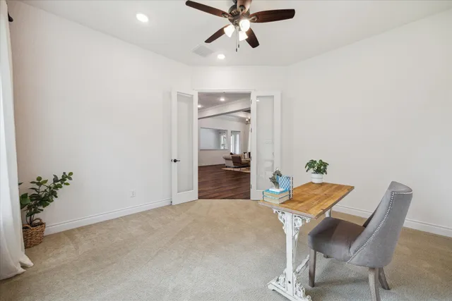 a workspace with furniture and window