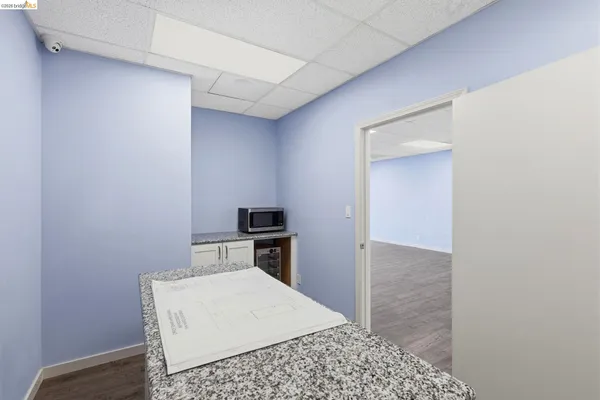 a view of empty room with windows
