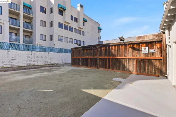 a view of backyard with small cabin