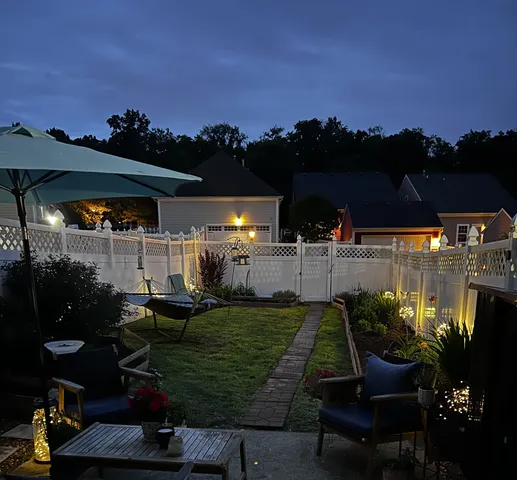 a garden view with a potted plant