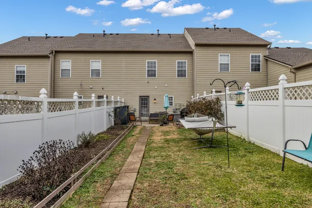 a park view with a bench roof