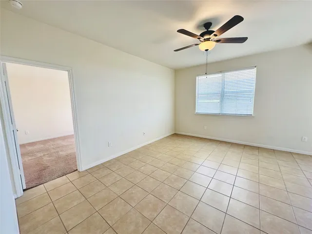 a view of kitchen with furniture and window