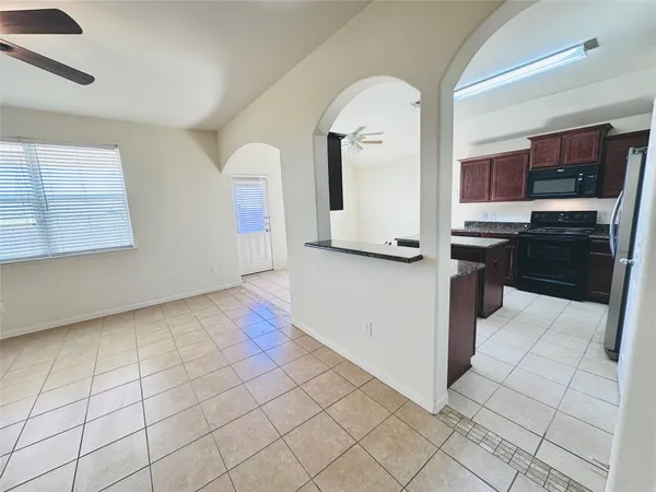 a view of an empty room and window