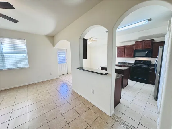 a view of a livingroom with a furniture