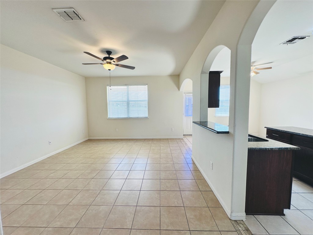 19309 W.T. Gallaway Street Manor, TX 78653 - Photo 16 of 38 a view of kitchen with furniture and window
