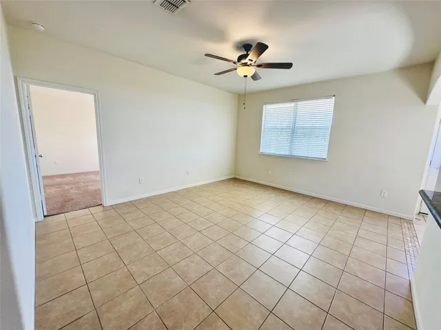 a kitchen with stainless steel appliances a refrigerator and a stove top oven