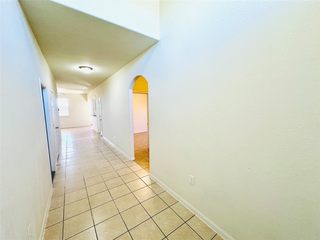 19309 W.T. Gallaway Street Manor, TX 78653 - Photo 2 of 38 a view of a room with a mirror