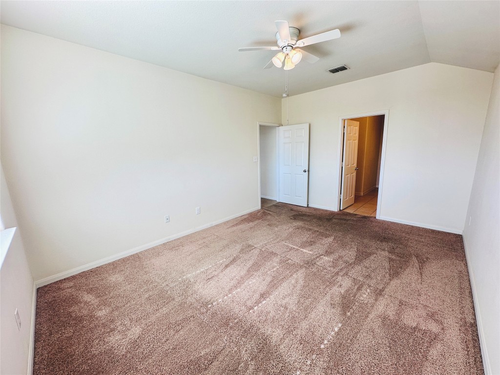 19309 W.T. Gallaway Street Manor, TX 78653 - Photo 28 of 38 a view of a big room with carpet
