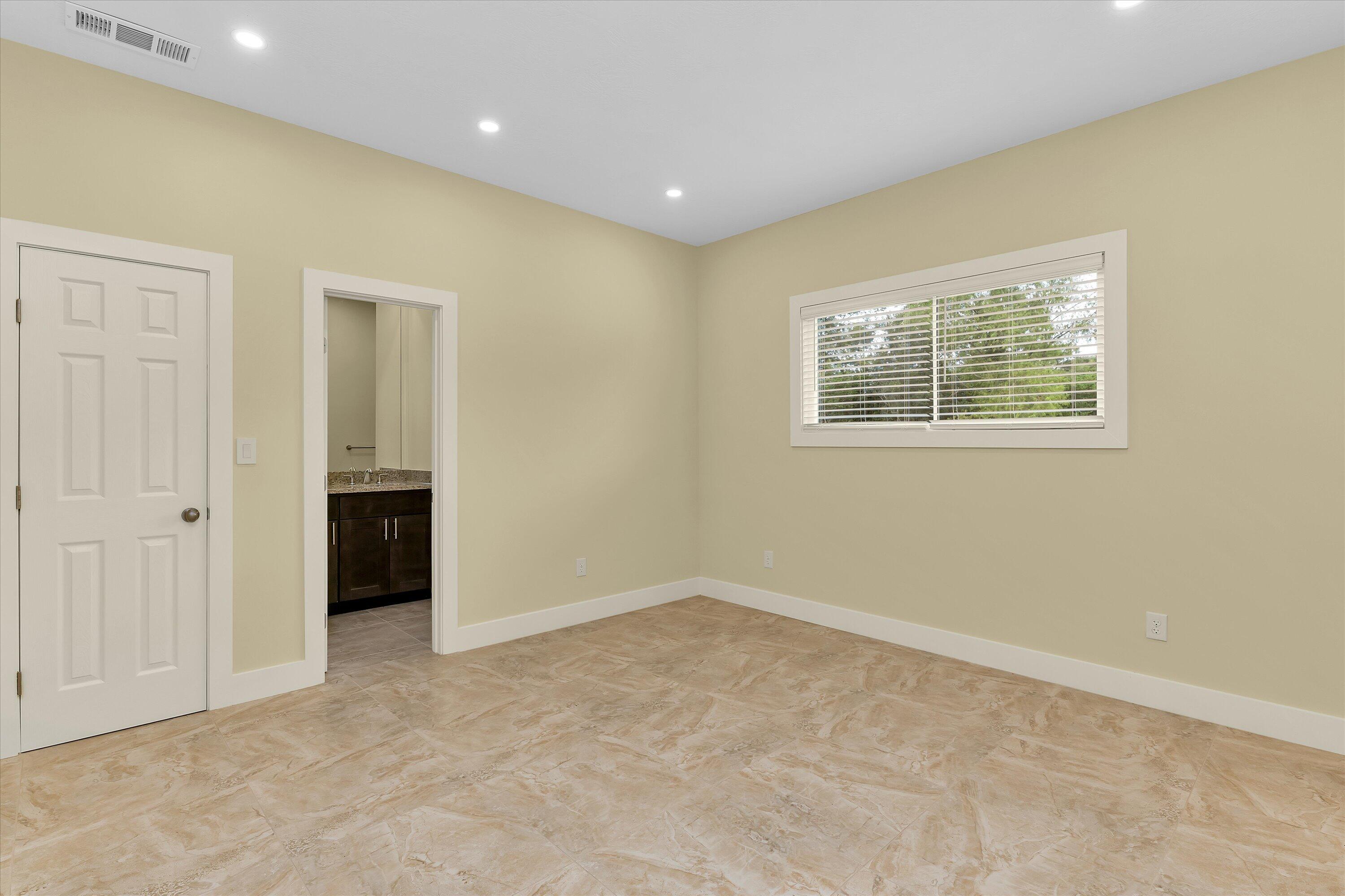 4625 Old Waynesboro Road Hephzibah, GA 30815 - Photo 13 of 34 Bedroom 2, off of the kitchen is large with two closets, and its own private bathroom.