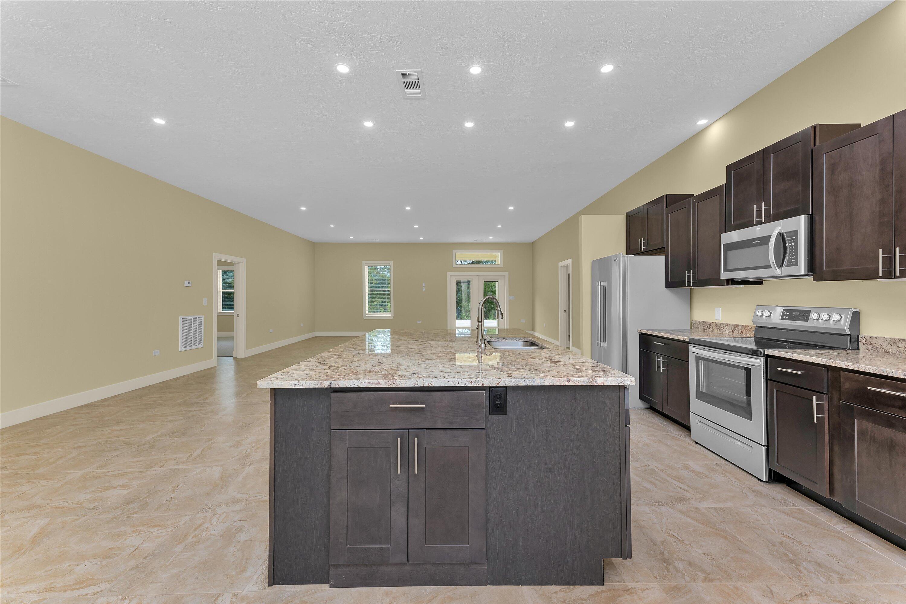 4625 Old Waynesboro Road Hephzibah, GA 30815 - Photo 7 of 34 Huge kitchen island great for entertaining guests, or a relaxed dinner at home.