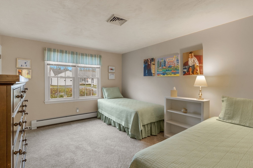 37 Ansel Howland Road Barnstable, MA 02632 - Photo 15 of 26 a bedroom with two beds and a window