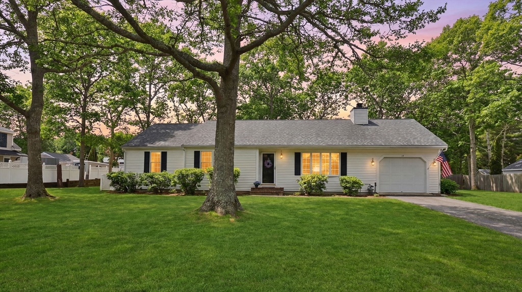 37 Ansel Howland Road Barnstable, MA 02632 - Photo 2 of 26 a front view of house with yard and green space