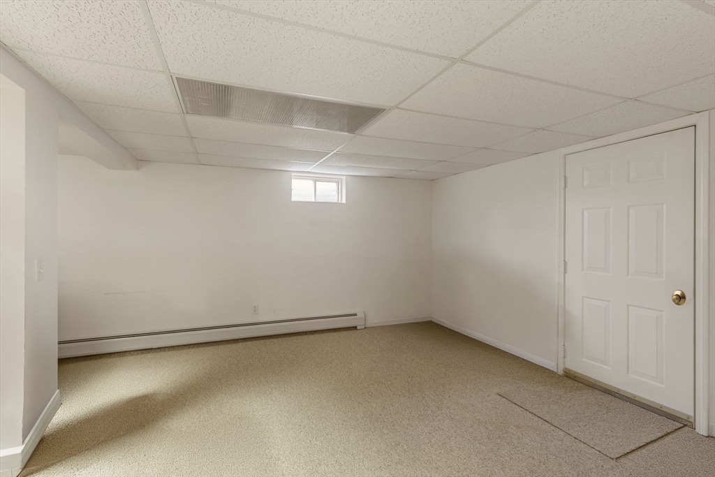 37 Ansel Howland Road Barnstable, MA 02632 - Photo 22 of 26 an empty room with a empty space and a window