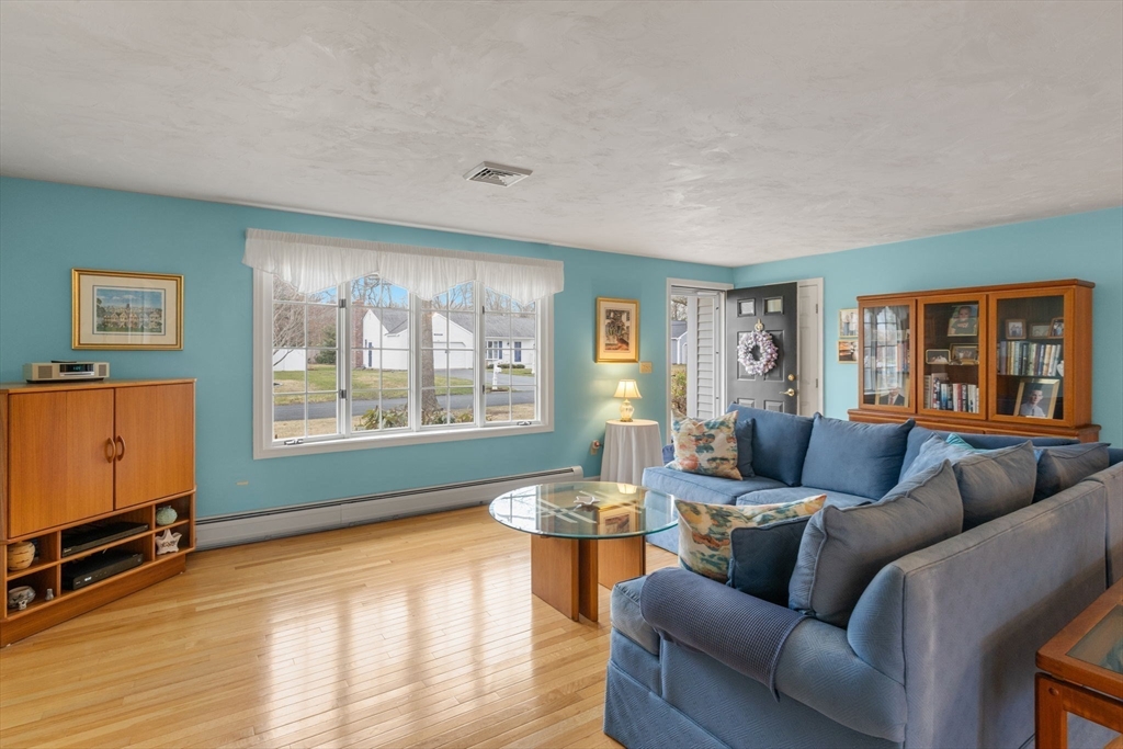 37 Ansel Howland Road Barnstable, MA 02632 - Photo 5 of 26 a living room with furniture and a large window