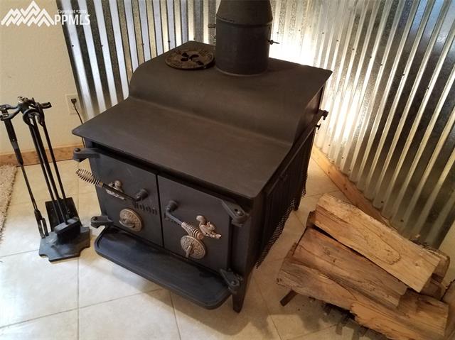 3333 Nugget Road Fairplay, CO 80440 - Photo 11 of 22 Lower level wood-burning stove