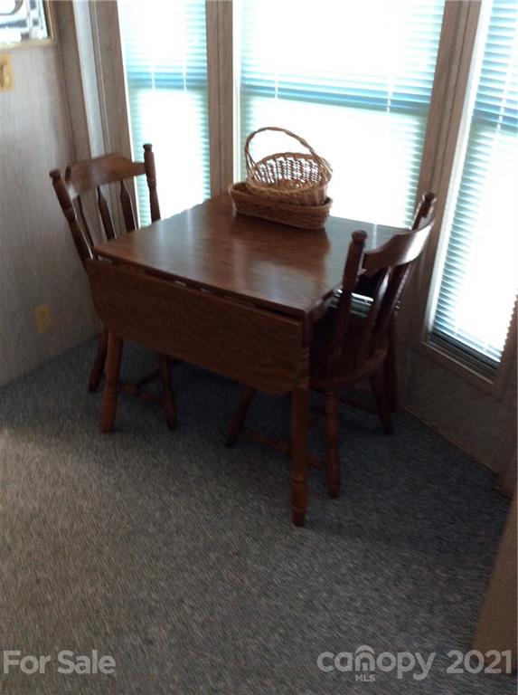 306 Mallard Loop Waynesville, NC 28785 - Photo 11 of 19 a view of a workspace with furniture and window