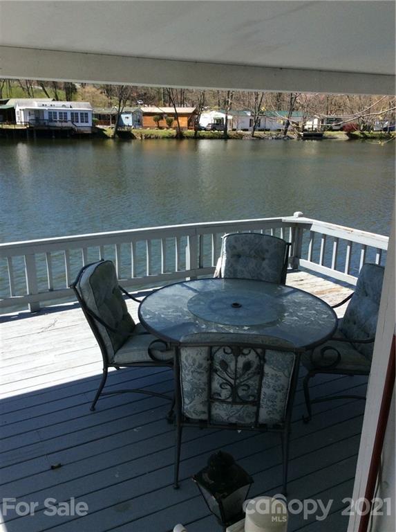 306 Mallard Loop Waynesville, NC 28785 - Photo 17 of 19 a view of a chairs on the roof deck