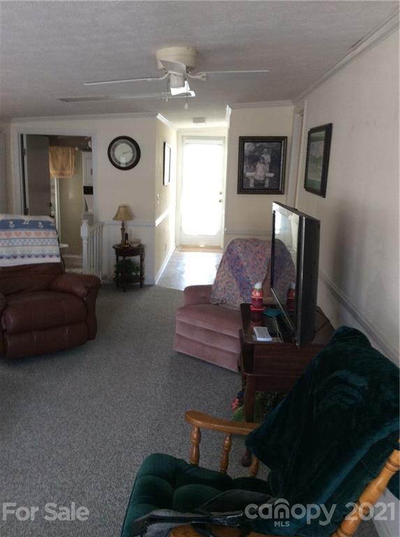 306 Mallard Loop Waynesville, NC 28785 - Photo 5 of 19 a living room with furniture and a window