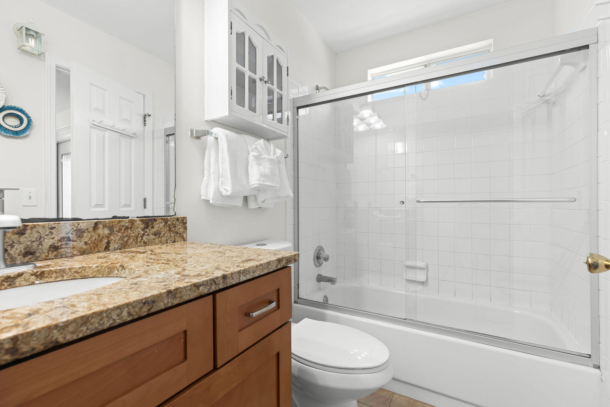 91 Matthew Boulevard Destin, FL 32541 - Photo 71 of 85 a bathroom with a granite countertop sink toilet and shower