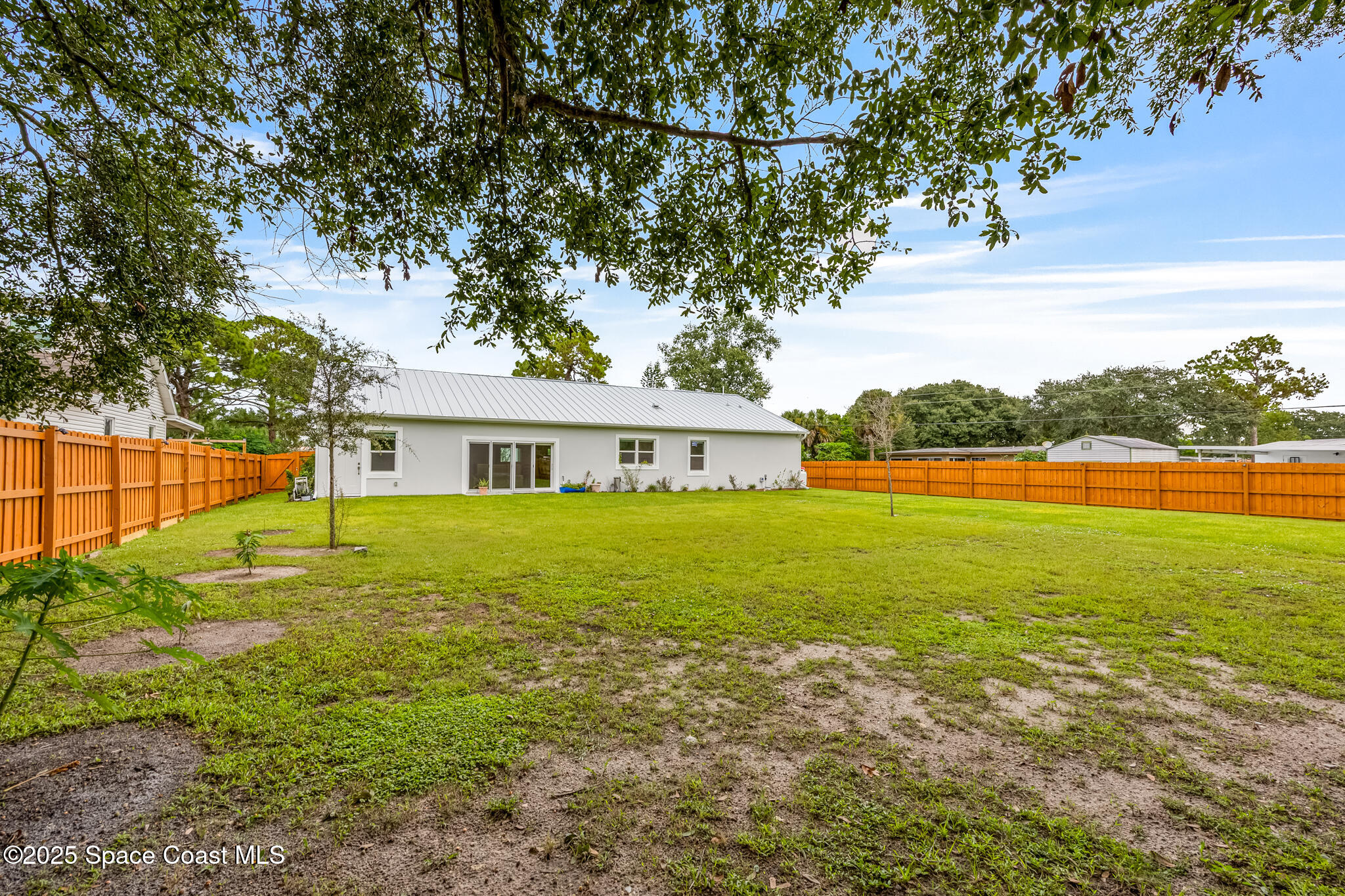1405 Highland Court Cocoa, FL 32922 - Photo 27 of 29 a view of outdoor space yard and swimming pool