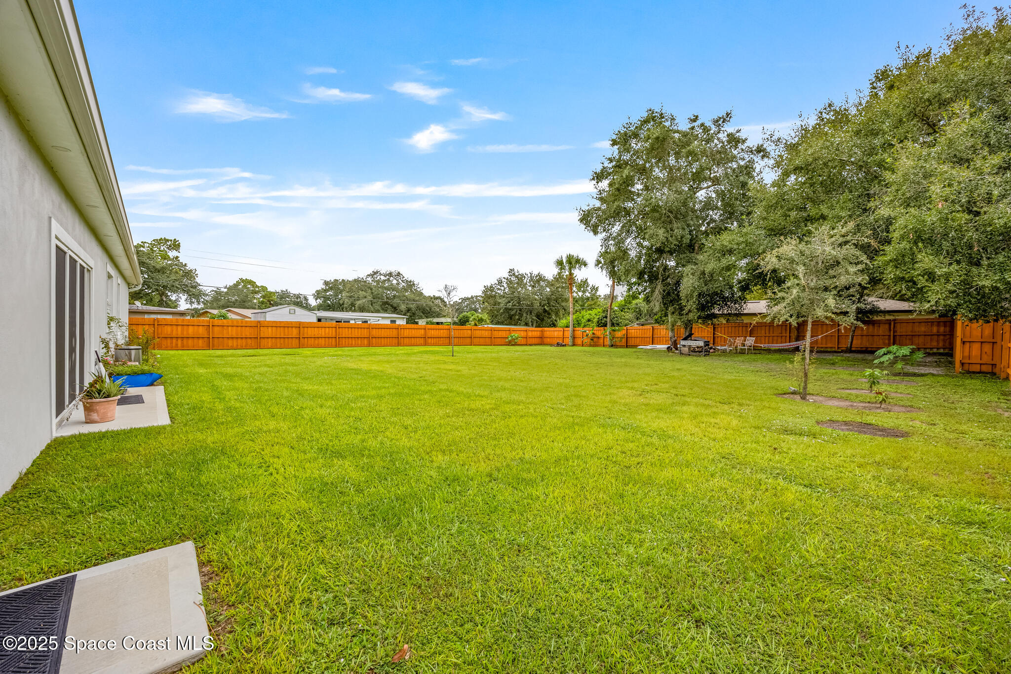 1405 Highland Court Cocoa, FL 32922 - Photo 28 of 29 a view of an outdoor space and swimming pool