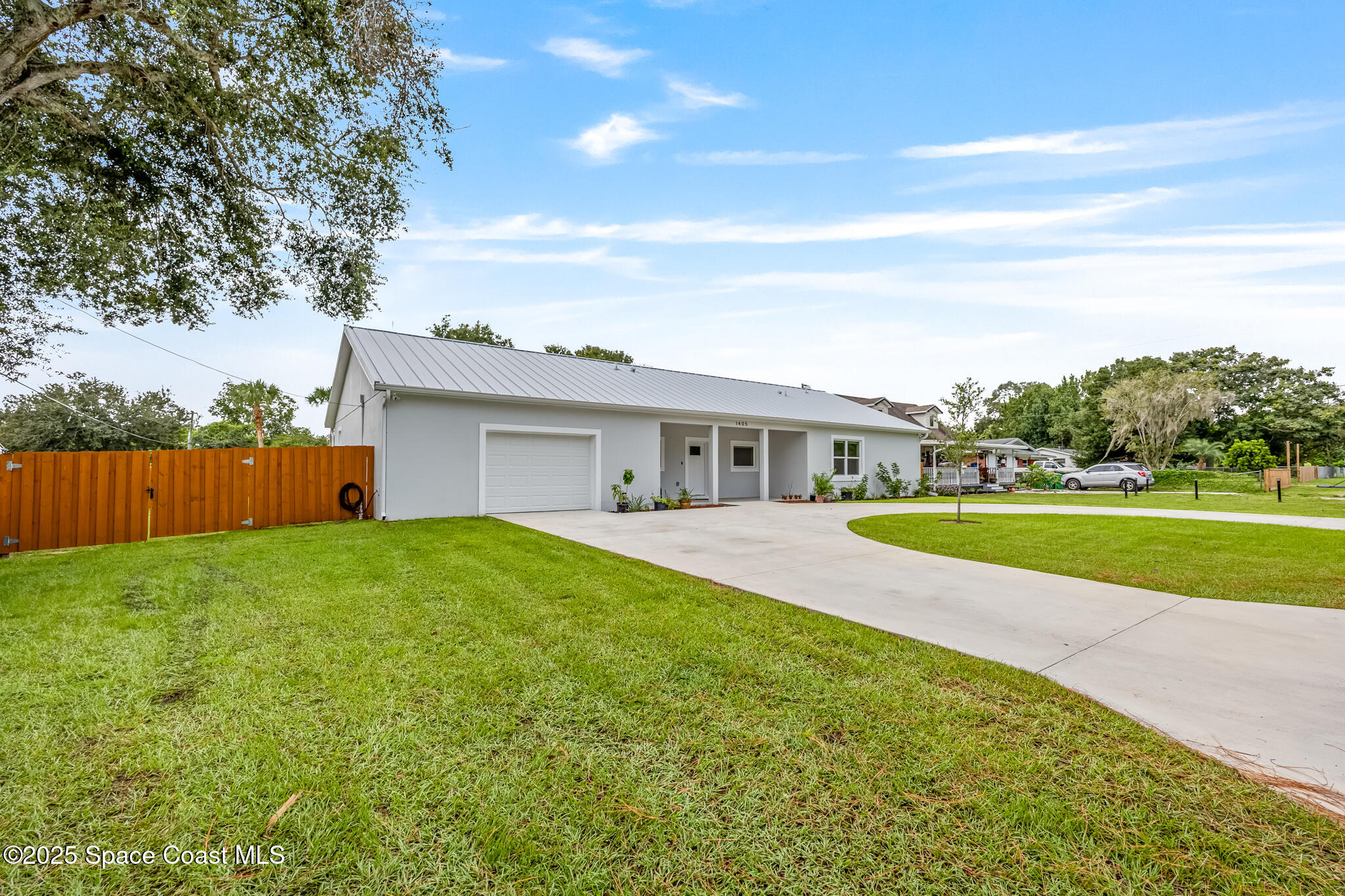 1405 Highland Court Cocoa, FL 32922 - Photo 3 of 29 a view of house with outdoor space and tub