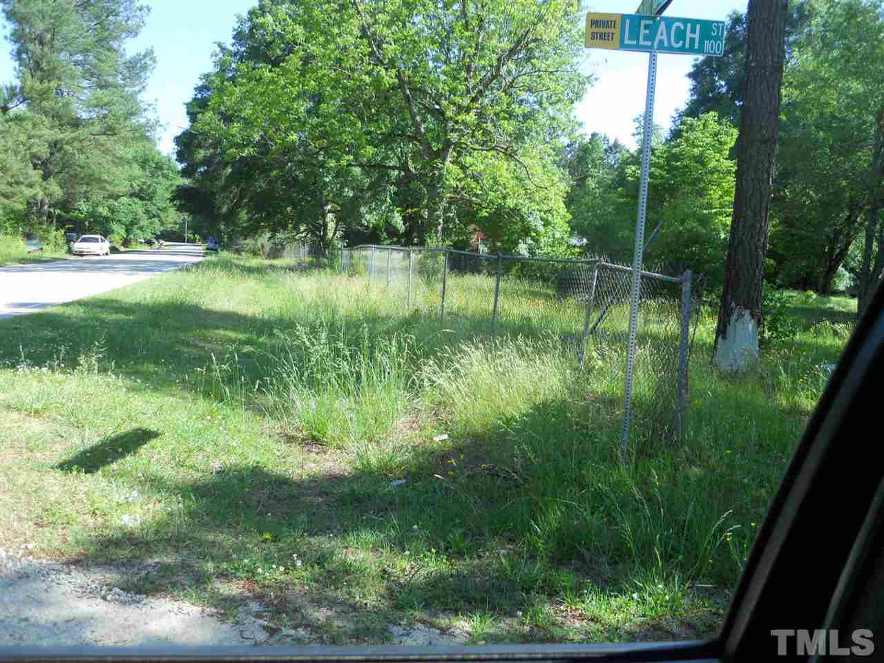 10800 Fanny Brown Road, Unit MULTI Raleigh, NC 27603 - Photo 3 of 3 a backyard of a house with lots of green space