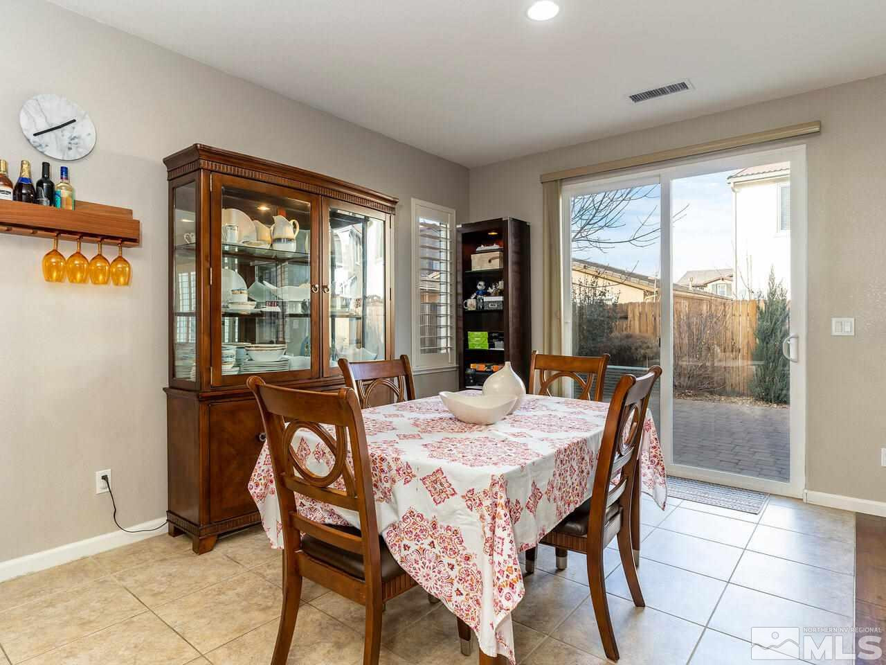 1925 Horse Prairie Road Reno, NV 89521 - Photo 12 of 32 a dining room with furniture and window