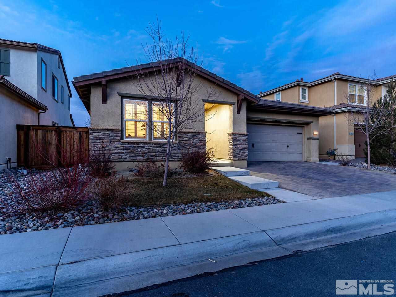 1925 Horse Prairie Road Reno, NV 89521 - Photo 2 of 32 a front view of a house with garden