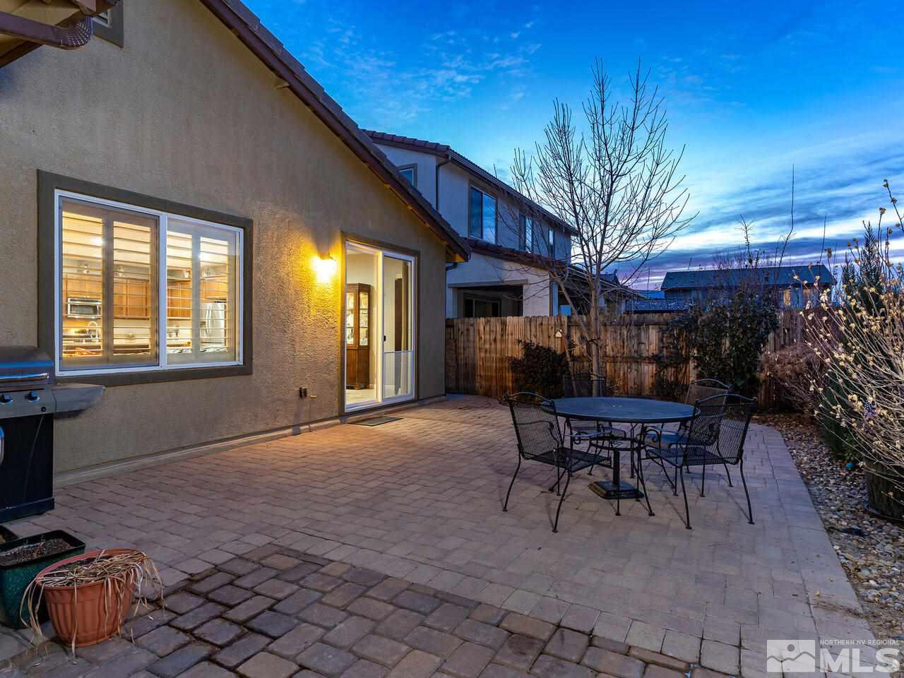 1925 Horse Prairie Road Reno, NV 89521 - Photo 29 of 32 a view of a patio with table and chairs and potted plants