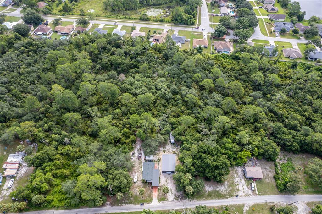North Road Deltona, FL 32725 - Photo 6 of 13 an aerial view of residential house with outdoor space and trees around