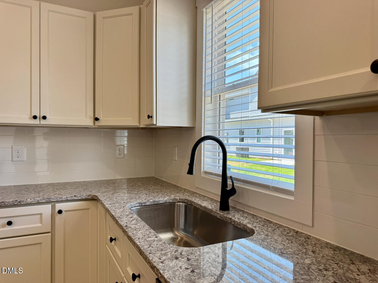 218 George Street Four Oaks, NC 27524 - Photo 10 of 33 Quartz Sink + Counter Detail