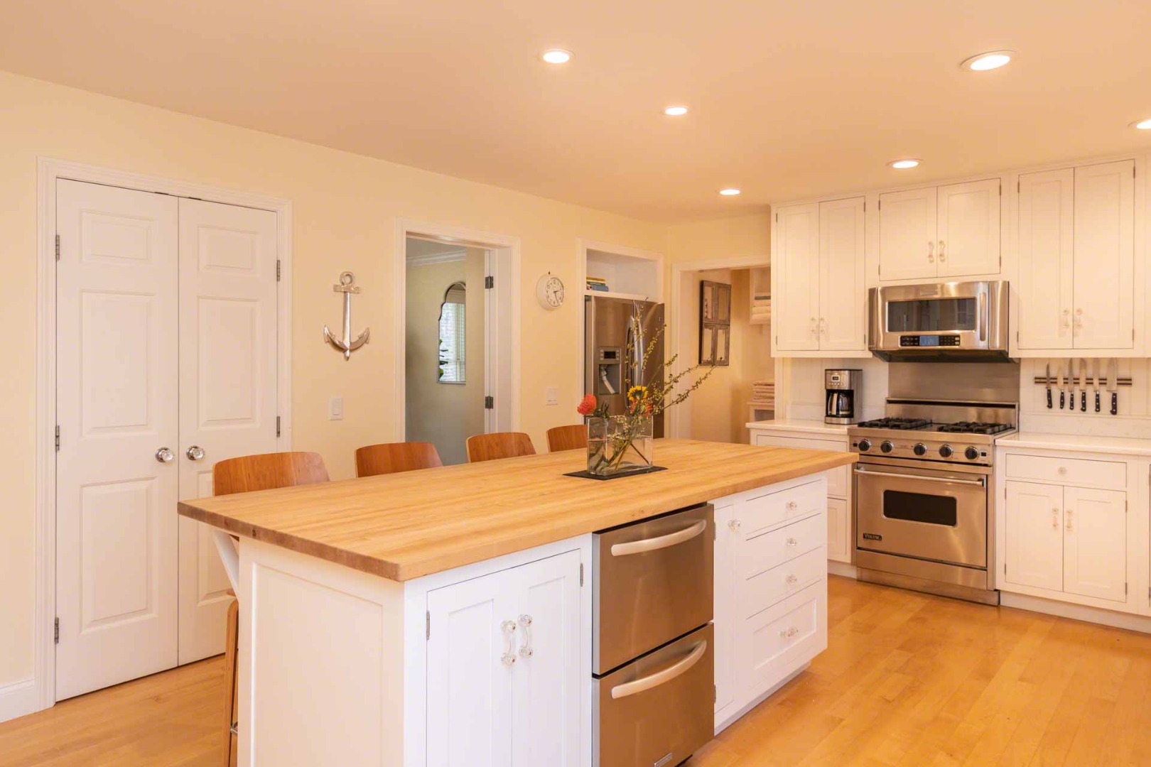 63 Norton Orchard Road Edgartown, MA 02539 - Photo 12 of 43 a kitchen that has a sink a stove and a refrigerator