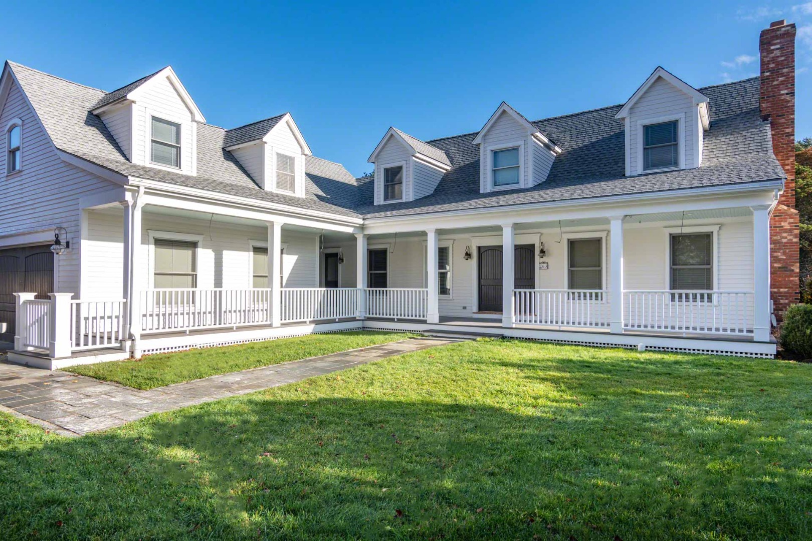 63 Norton Orchard Road Edgartown, MA 02539 - Photo 2 of 43 front view of a house with a yard